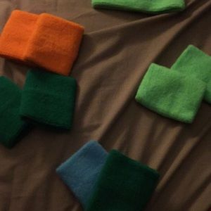 1 green sweat band for head 4 sets of wrist bands